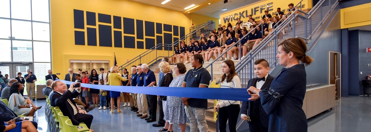 Students and staff cut the ribbon to open the Campus of Wickliffe
