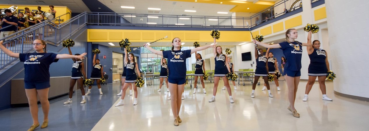 Cheerleaders and majorettes perform in the Campus of Wickliffe Commons